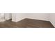 Hallway with dark wood floors and white trim at 989 Cades Walk, Lawrenceville, GA 30045