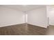 Open concept living room features hardwood floors at 989 Cades Walk, Lawrenceville, GA 30045