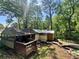 Home exterior with storm damage and fallen tree, and back deck at 202 Hayes St, Villa Rica, GA 30180