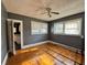 Bright bedroom with hardwood floors and view into kitchen at 880 Cascade Sw Rd, Atlanta, GA 30311