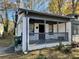 Charming house with a white brick facade and porch at 880 Cascade Sw Rd, Atlanta, GA 30311