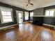 Living room with hardwood floors, fireplace, and high ceilings at 880 Cascade Sw Rd, Atlanta, GA 30311