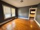 Spacious living room with hardwood floors and neutral walls at 880 Cascade Sw Rd, Atlanta, GA 30311