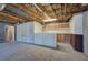 Basement area with wet bar, exposed ceiling, and concrete wall at 3634 Autumn Ridge Pkwy, Marietta, GA 30066