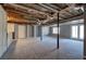 Unfinished basement with exposed ceiling, carpeted floor, and access to the outdoors at 3634 Autumn Ridge Pkwy, Marietta, GA 30066