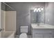 A full bathroom with a tub and shower combination with white vanity at 3634 Autumn Ridge Pkwy, Marietta, GA 30066