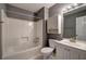 A full bathroom with a tub and shower combination with white vanity at 3634 Autumn Ridge Pkwy, Marietta, GA 30066