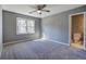 Bedroom featuring ceiling fan and access to bathroom at 3634 Autumn Ridge Pkwy, Marietta, GA 30066