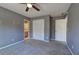 Bedroom featuring ceiling fan, closet and access to bathroom at 3634 Autumn Ridge Pkwy, Marietta, GA 30066