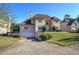 Charming two-story home with a well-manicured lawn, driveway and attached two-car garage at 3634 Autumn Ridge Pkwy, Marietta, GA 30066