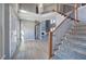 Bright foyer with staircase and natural light, features wood-look flooring, gray walls, and white trim at 3634 Autumn Ridge Pkwy, Marietta, GA 30066