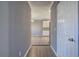 Hallway view leading into kitchen with white cabinets at 3634 Autumn Ridge Pkwy, Marietta, GA 30066