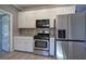 Kitchen featuring stainless steel appliances and ample cabinet space at 3634 Autumn Ridge Pkwy, Marietta, GA 30066