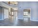 Bright living room with soaring ceilings, hardwood floors, fresh paint and natural light at 3634 Autumn Ridge Pkwy, Marietta, GA 30066