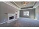 Spacious main bedroom featuring a cozy fireplace, large window, and ensuite bathroom at 3634 Autumn Ridge Pkwy, Marietta, GA 30066