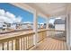 Scenic view from the balcony featuring the neighborhood and bright blue sky with clouds at 1230 Firefly Field Trce, Lawrenceville, GA 30045