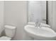 Powder room featuring modern fixtures and a stylish vanity sink at 1230 Firefly Field Trce, Lawrenceville, GA 30045