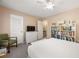 A bright bedroom with a ceiling fan, adjacent to the bathroom at 1101 Collier Nw Rd # V6, Atlanta, GA 30318