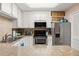 Well-equipped kitchen with granite counters and stainless steel appliances at 1101 Collier Nw Rd # V6, Atlanta, GA 30318