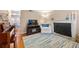 Bright and open living room featuring a piano, fireplace, and TV at 1101 Collier Nw Rd # V6, Atlanta, GA 30318