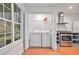 Modern kitchen with laundry appliances at 113 Ambridge Ct, Lawrenceville, GA 30044