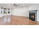 Inviting living room showcasing hardwood floors and a fireplace, creating a cozy atmosphere at 113 Ambridge Ct, Lawrenceville, GA 30044