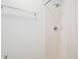The bright white shower features a shower curtain and chrome fixtures at 113 Ambridge Ct, Lawrenceville, GA 30044