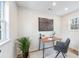 Bright home office with hardwood floors, natural light, and a work space at 1147 Graymont Sw Dr, Atlanta, GA 30310