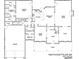 A detailed first floor plan displaying the kitchen, living spaces, and garage at 1949 Pucketts Sw Dr, Lilburn, GA 30047