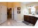 Stylish bathroom features a modern vanity with ample storage and decorative accents, creating a serene atmosphere at 907 Hannah Ct, Loganville, GA 30052