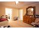 Bedroom with vanity, carpet flooring, with a view of a walk-in closet at 907 Hannah Ct, Loganville, GA 30052