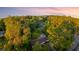 Stunning aerial view captures a charming home nestled amidst a green forest landscape at 3293 Valleydale Sw Dr, Atlanta, GA 30311