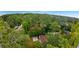 Aerial view of a nice property with mature tree coverage and a long driveway at 3293 Valleydale Sw Dr, Atlanta, GA 30311