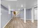 Finished basement with modern flooring, neutral paint, and bright recessed lighting at 3293 Valleydale Sw Dr, Atlanta, GA 30311