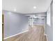 Spacious finished basement with modern flooring and neutral paint and bright windows at 3293 Valleydale Sw Dr, Atlanta, GA 30311