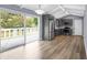 Bright eat-in kitchen featuring gray cabinets, granite counters and stainless-steel appliances at 3293 Valleydale Sw Dr, Atlanta, GA 30311