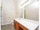 Bathroom with double vanity, updated fixtures, and tile flooring at 7077 Ravenwood Ln, Lithonia, GA 30038
