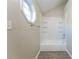 Updated bathroom with shower/tub combo and tile flooring at 7077 Ravenwood Ln, Lithonia, GA 30038