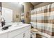 Bathroom with a toilet, shower, and large vanity at 595 Everton Pl, Grayson, GA 30017