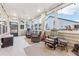 Relaxing sunroom with comfortable seating and natural light at 595 Everton Pl, Grayson, GA 30017