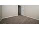 Simple bedroom with neutral walls and carpet at 604 Beaujolais Ct, Mcdonough, GA 30253