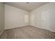 Spacious bedroom with neutral walls and carpet at 604 Beaujolais Ct, Mcdonough, GA 30253