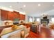 Open kitchen featuring a large island, stainless steel appliances, and hardwood floors at 324 Mary Dr, Mcdonough, GA 30252