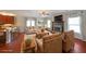 Inviting living room with a fireplace, comfortable seating, and abundant natural light at 324 Mary Dr, Mcdonough, GA 30252