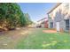 Large backyard with privacy trees and patio at 129 Janney Cir, Mcdonough, GA 30253