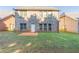 Brick home with fenced backyard and patio at 129 Janney Cir, Mcdonough, GA 30253
