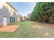 Large backyard with grassy area and patio at 129 Janney Cir, Mcdonough, GA 30253