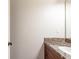 Simple bathroom with granite countertop and single sink vanity at 129 Janney Cir, Mcdonough, GA 30253