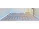 Bright bedroom featuring neutral walls and plush carpeting at 129 Janney Cir, Mcdonough, GA 30253