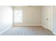 Spacious bedroom with new carpet and neutral walls at 129 Janney Cir, Mcdonough, GA 30253
